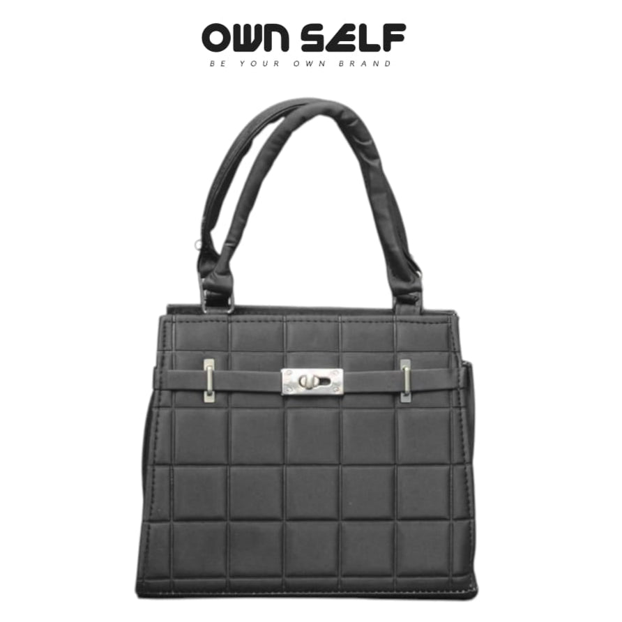 Black quilted handbag on a white background with 'OWN SELF' branding.
